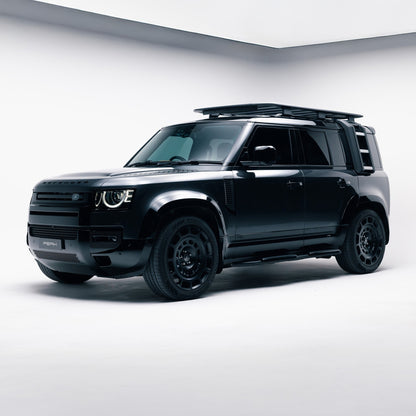 Land Rover Defender 110 front three-quarter view with Gloss Black door mouldings