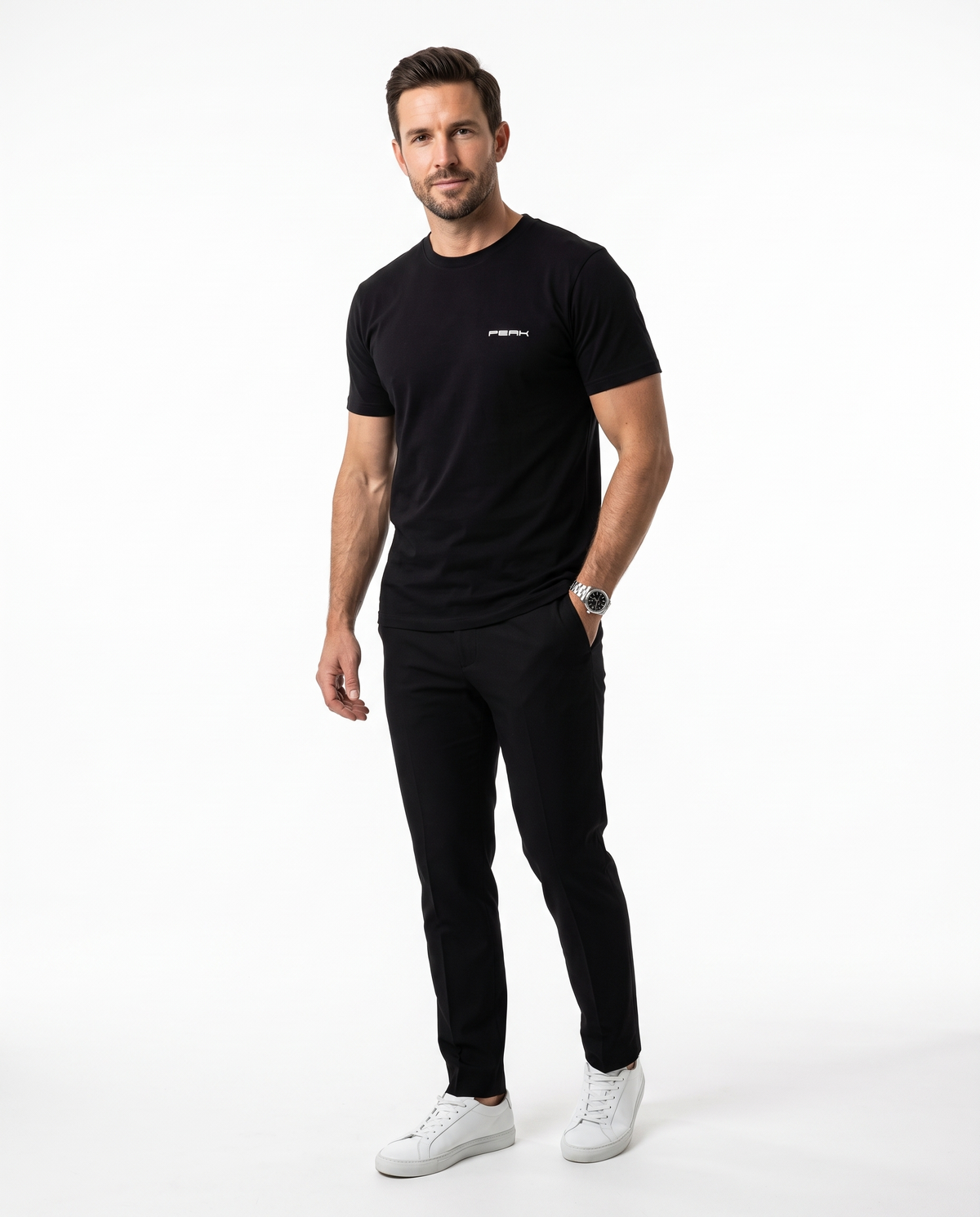 PEAK Tee, Chest & Spine Print in Black, worn showing the small left chest mark