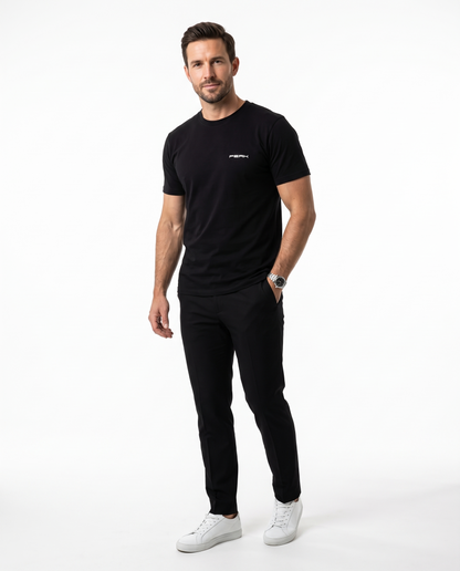 PEAK Tee, Chest & Spine Print in Black, worn showing the small left chest mark